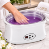 Hand paraffin wax treatment using a digital paraffin warmer for moisturizing skin care