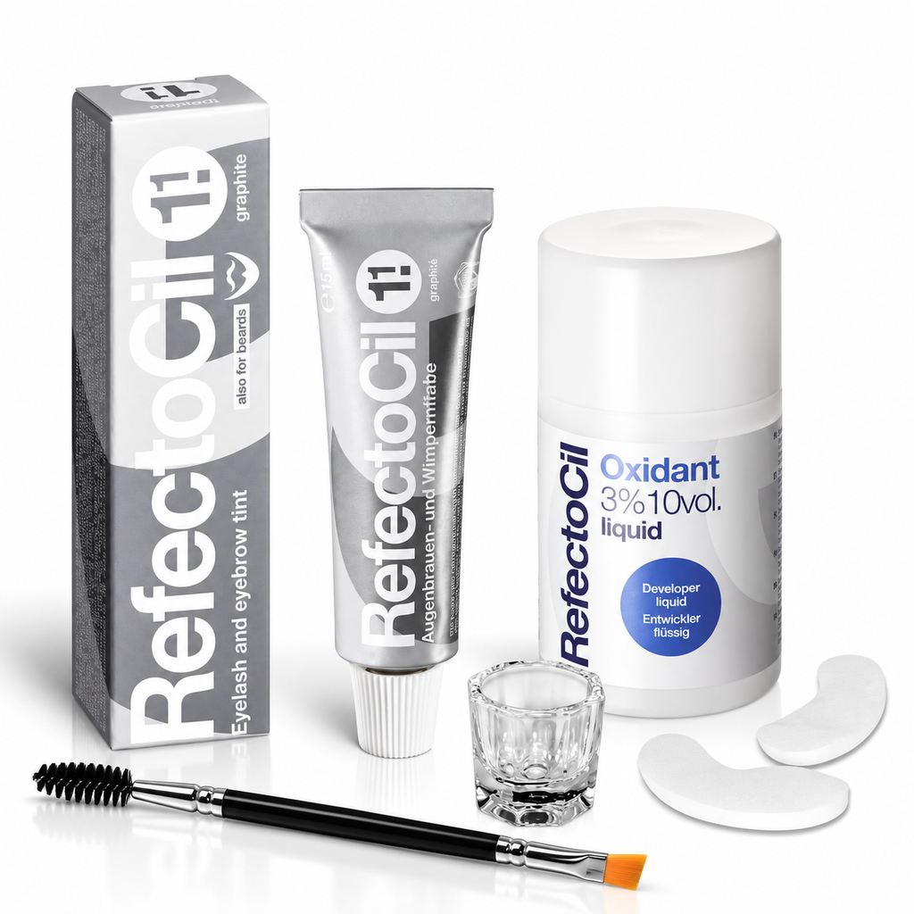 RefectoCil No. 1.1 Graphite brow tint kit with Oxidant 3% liquid developer, under-eye pads, clear mixing glass and dual-ended tint brush on a white background